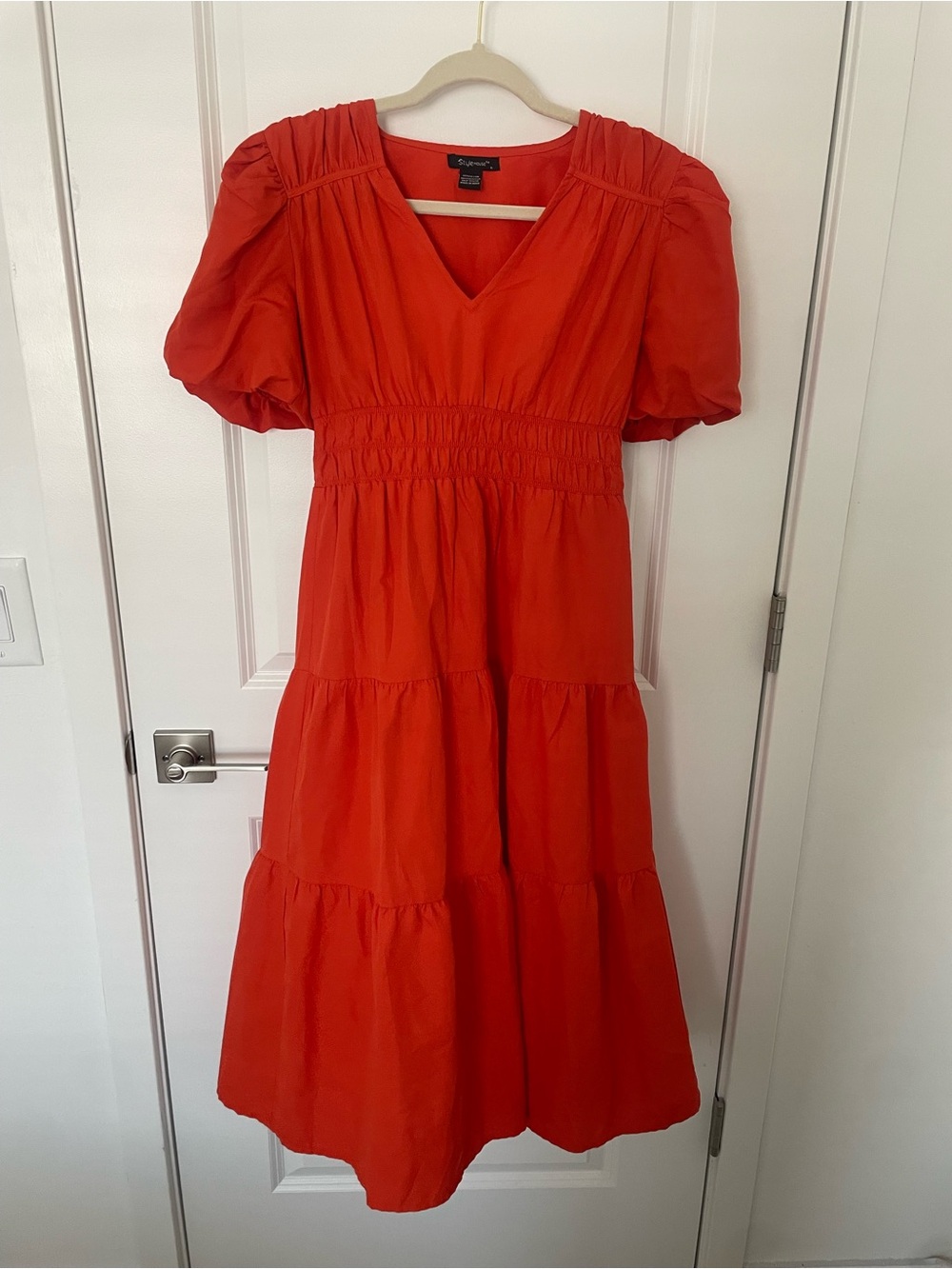 Orange puff sleeve tiered dress